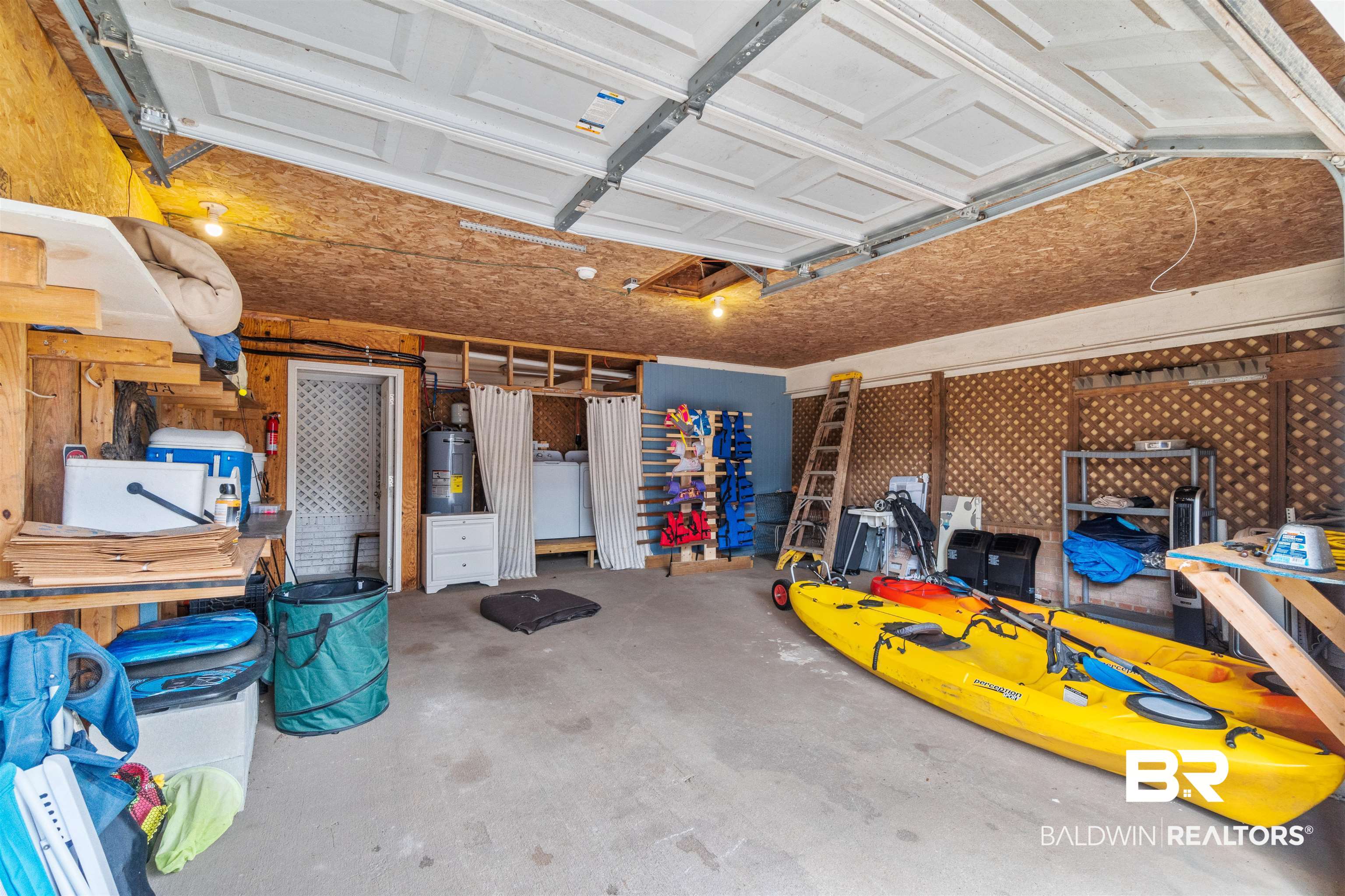 17595 River Road Summerdale, AL 36580 - Photo 13 of 29 Garage featuring water heater