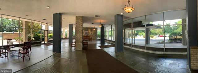 a view of a balcony with chairs