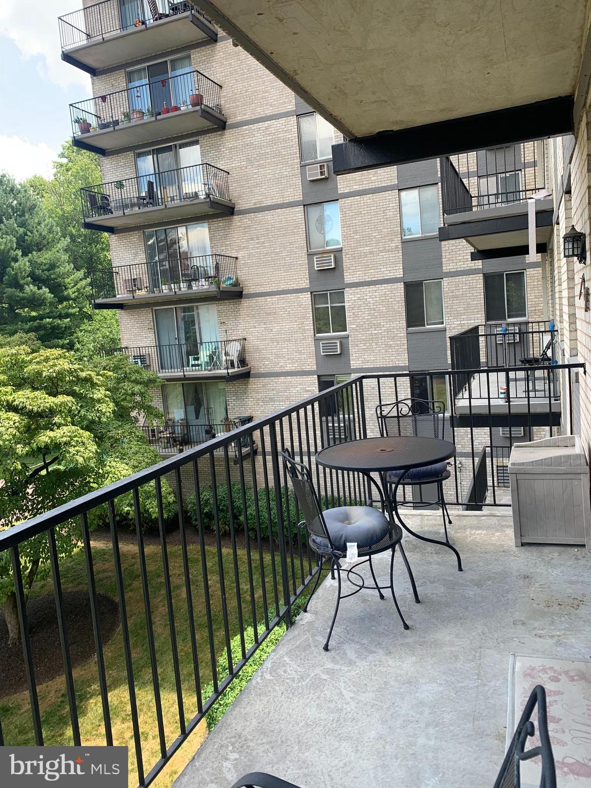 3245 Rio Drive, Unit 307 Falls Church, VA 22041 - Photo 27 of 39 a view of a balcony with chairs
