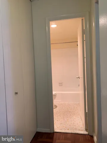 a view of a kitchen with cabinets