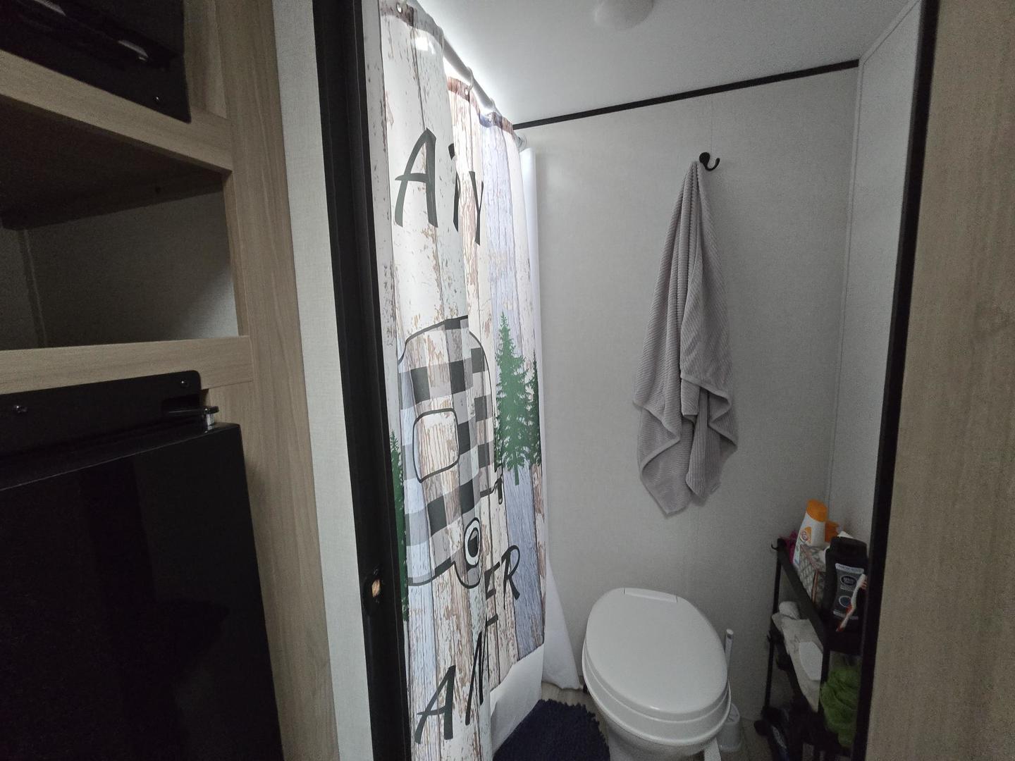 17-249 Woodhaven Sublette, IL 61367 - Photo 11 of 14 a bathroom with a shower a toilet and a sink