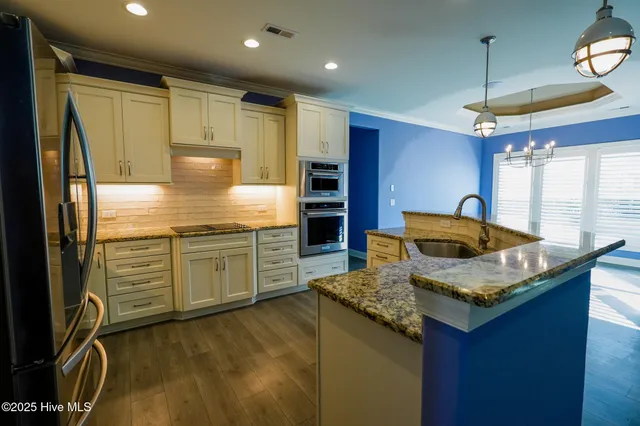 $715,000 | 8567 Safflower Way Northeast, Leland, NC 28451