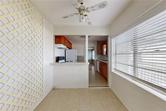 a view of a kitchen with a sink and dishwasher