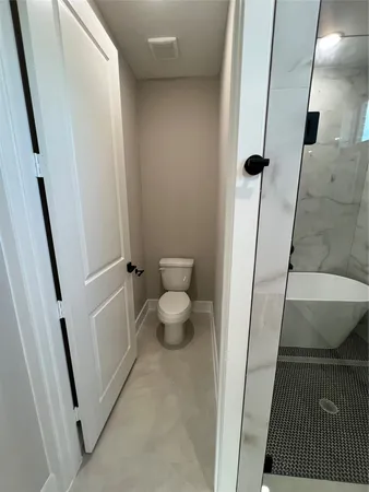 a bathroom with a sink and a toilet