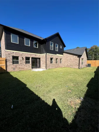 a house view with a garden space