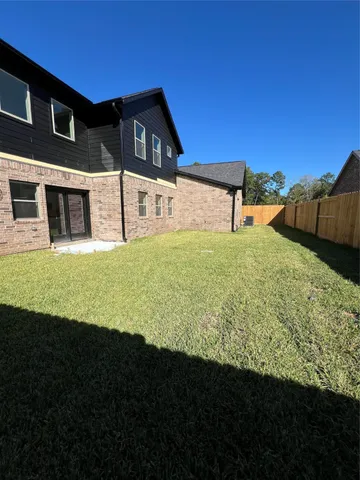 a house view with a garden space