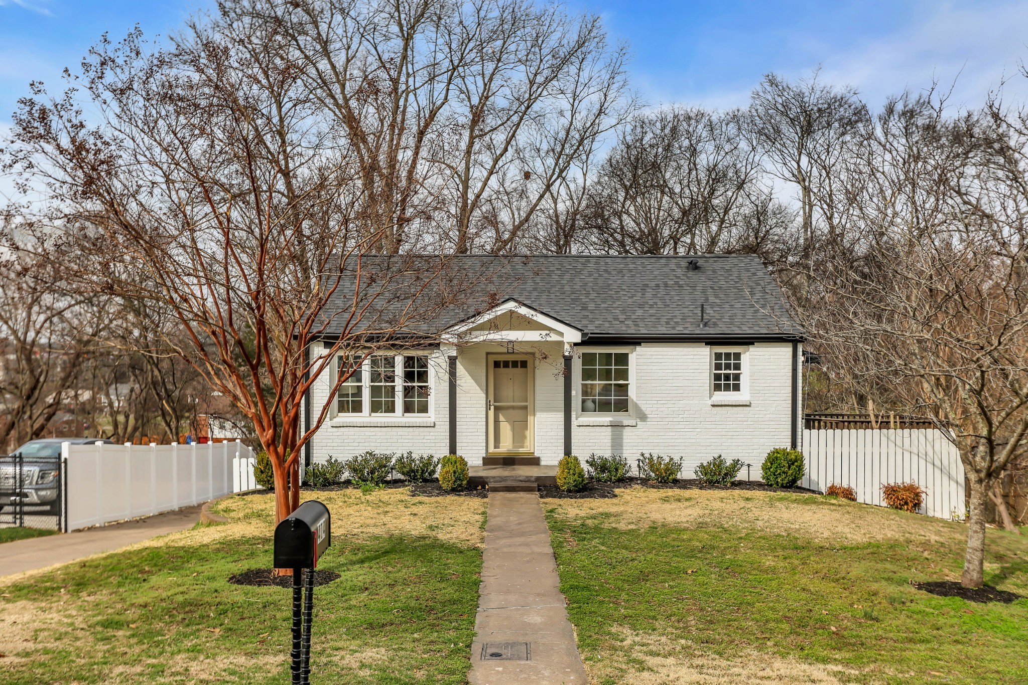 414 Springview Drive Nashville, TN 37214 - Photo 1 of 43 a front view of a house with garden