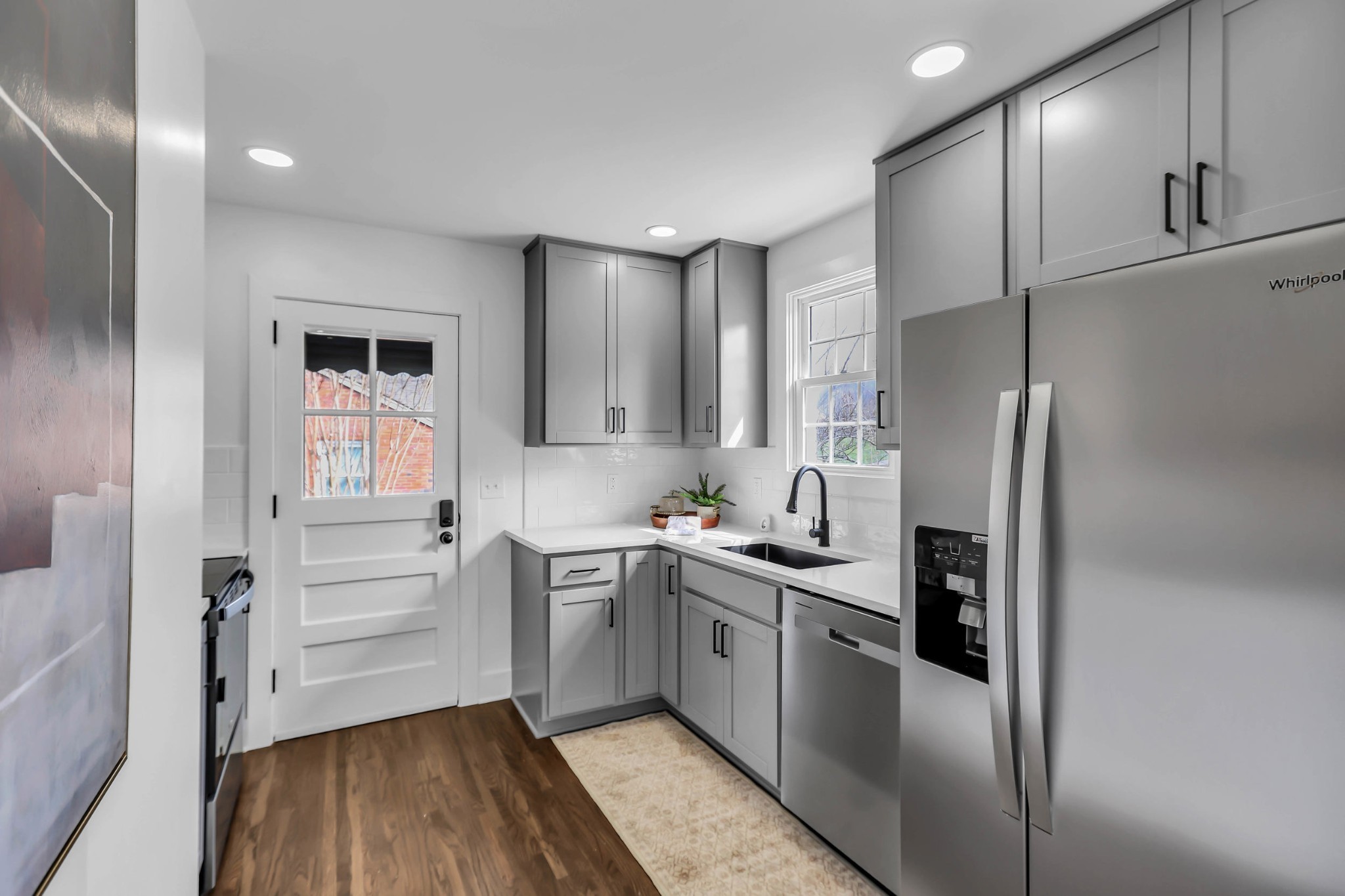 414 Springview Drive Nashville, TN 37214 - Photo 13 of 43 a kitchen with a sink stainless steel appliances and cabinets