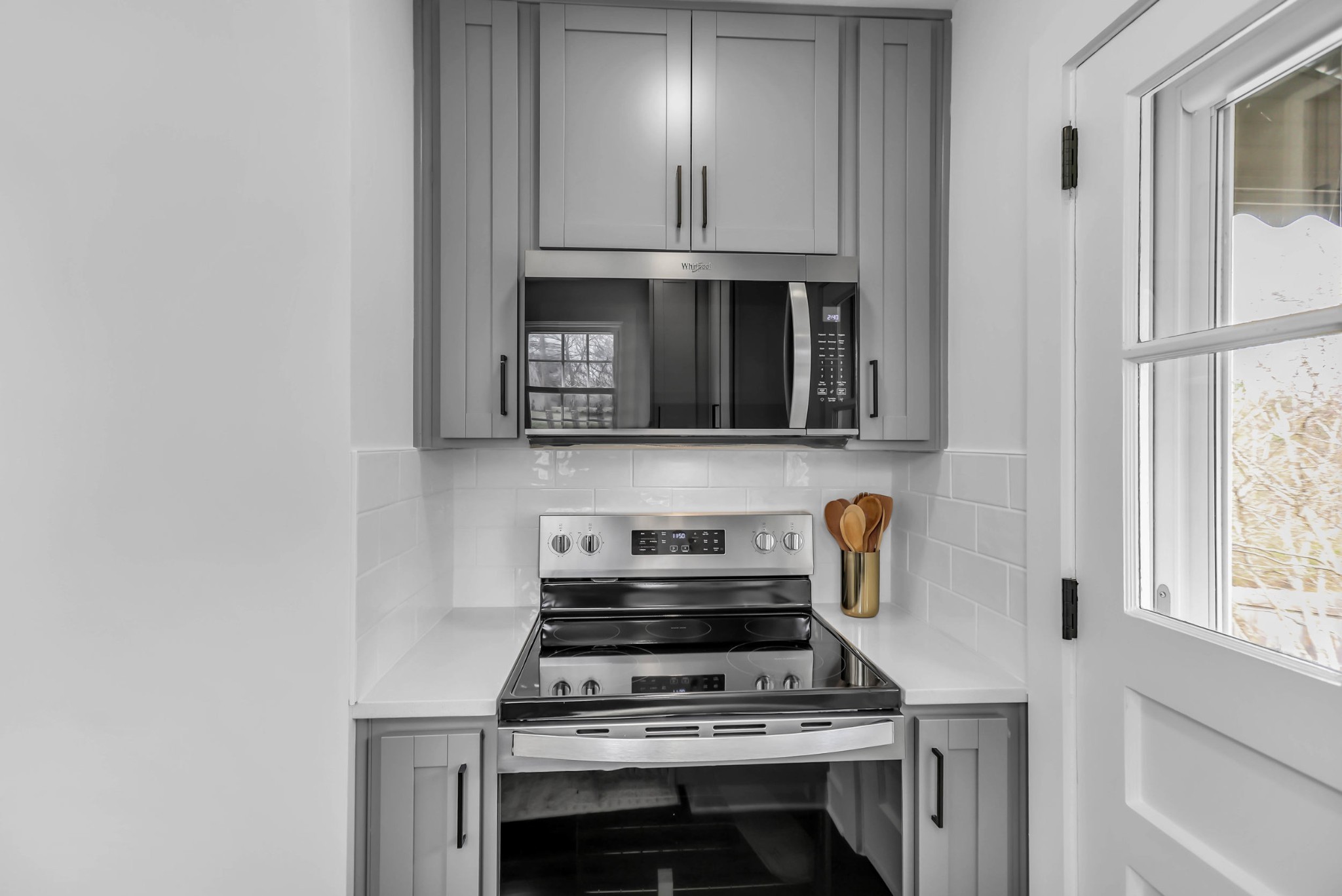 414 Springview Drive Nashville, TN 37214 - Photo 14 of 43 a kitchen with a stove and a microwave