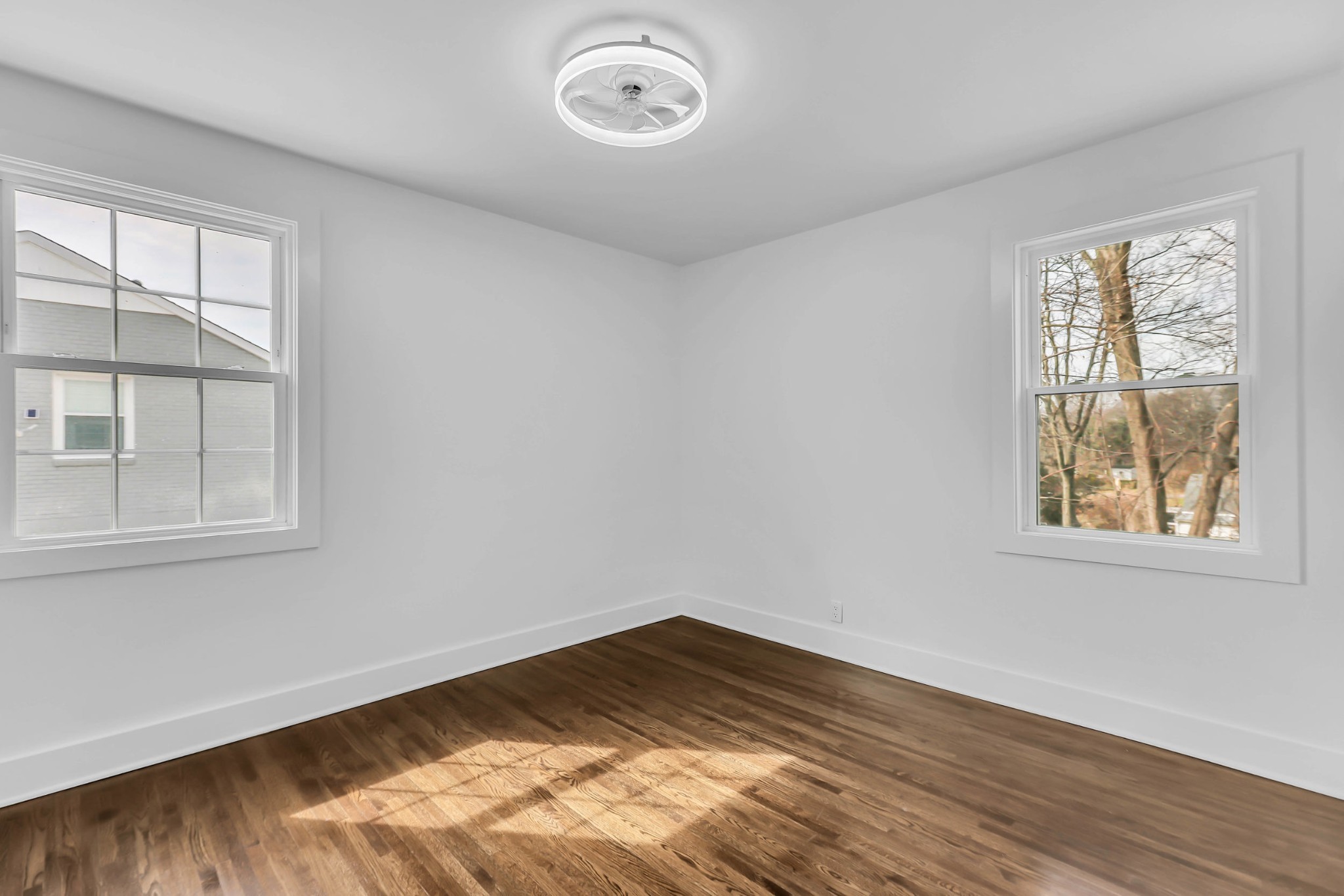 414 Springview Drive Nashville, TN 37214 - Photo 17 of 43 a view of empty room with wooden floor and fan