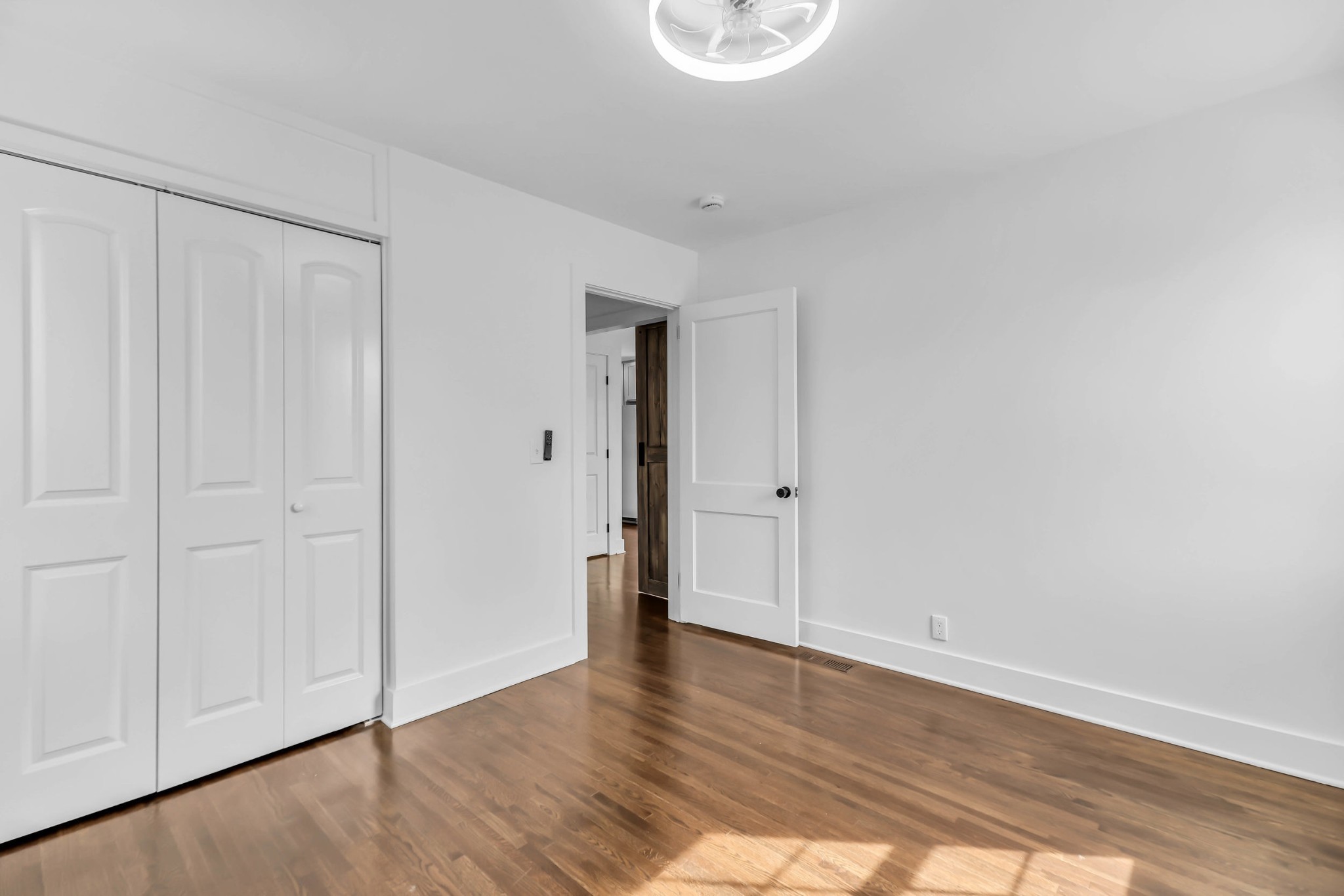 414 Springview Drive Nashville, TN 37214 - Photo 18 of 43 a view of an empty room with wooden floor