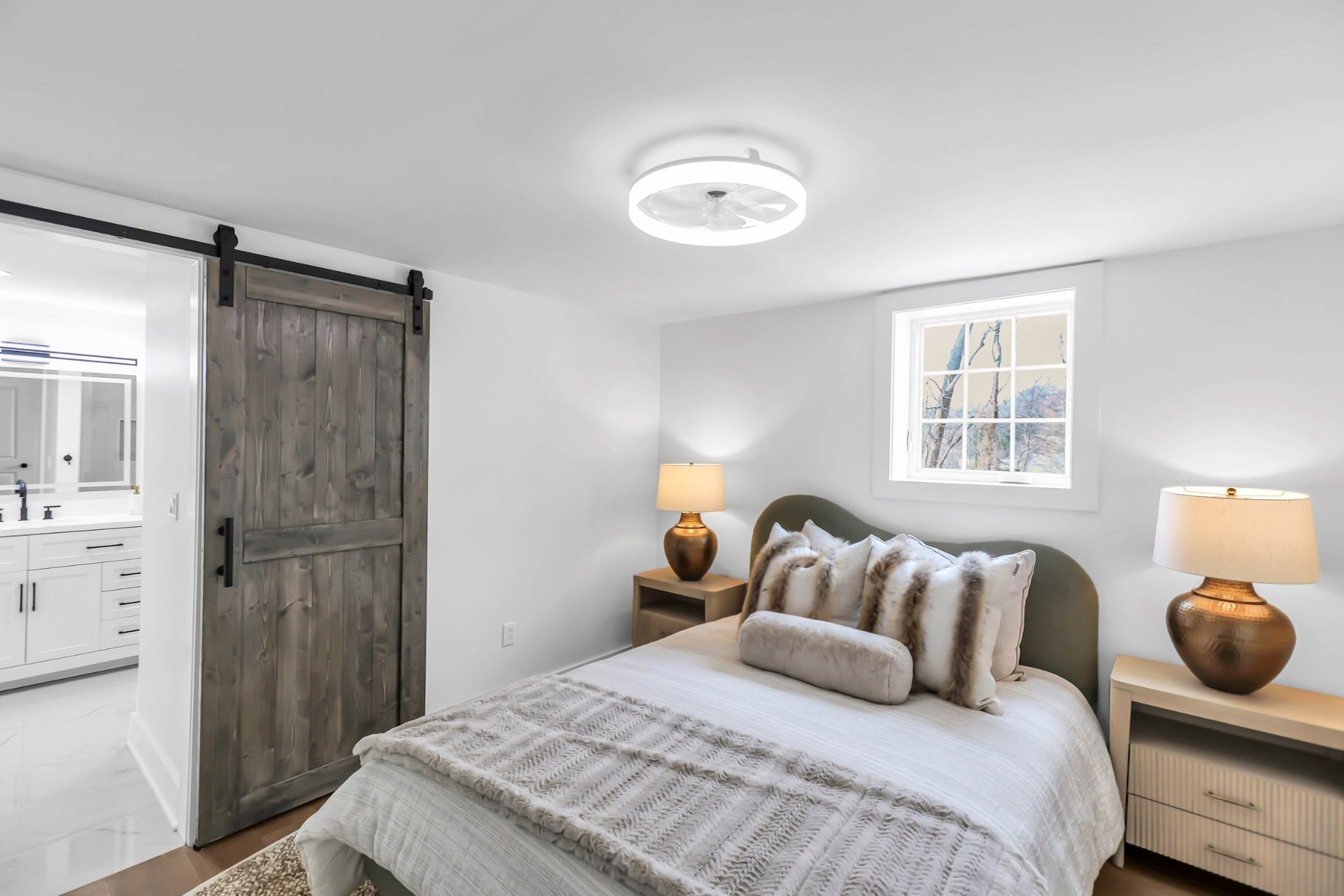 414 Springview Drive Nashville, TN 37214 - Photo 25 of 43 a bedroom with a bed and closet with mirror