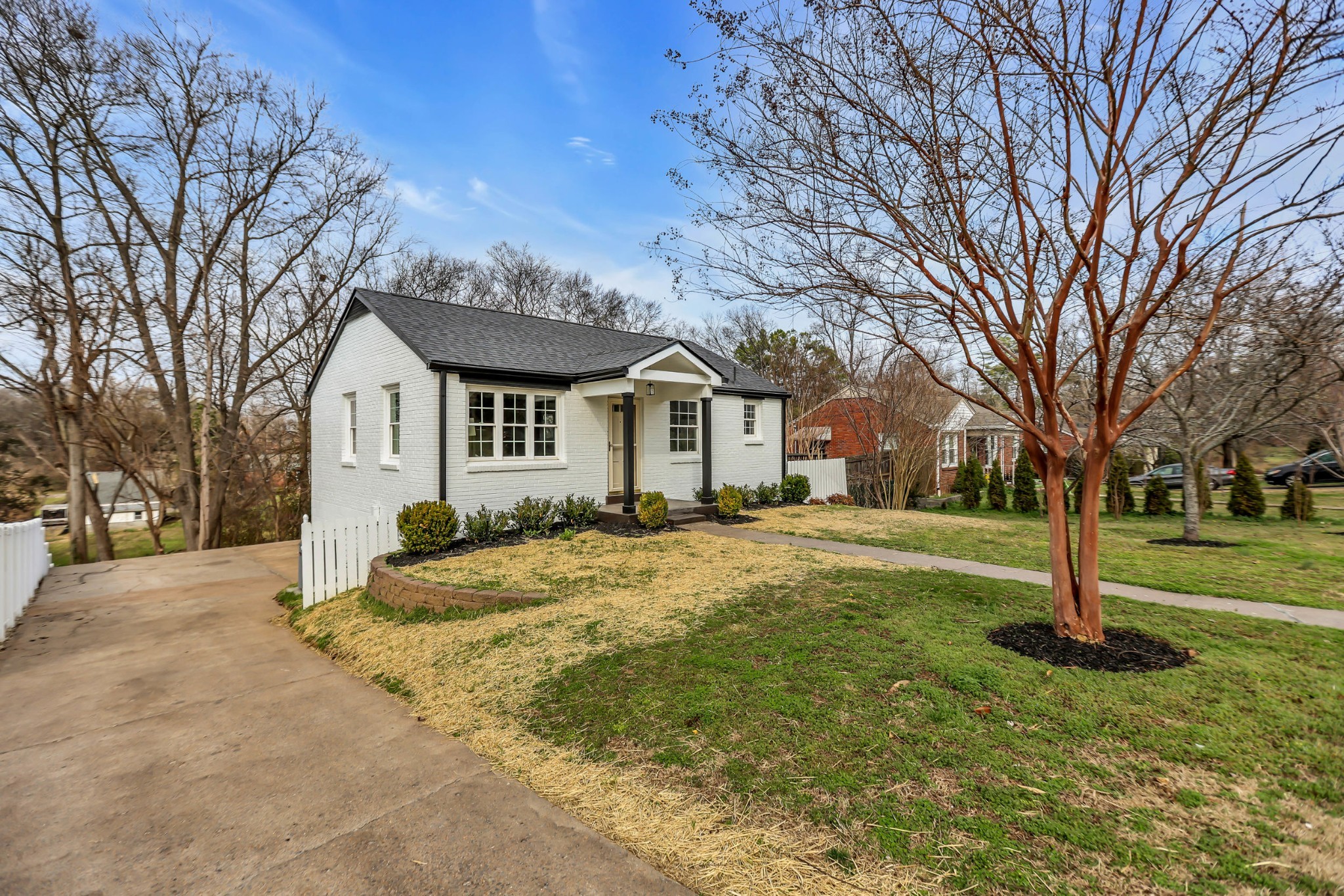414 Springview Drive Nashville, TN 37214 - Photo 3 of 43 a view of a yard with a house and a tree