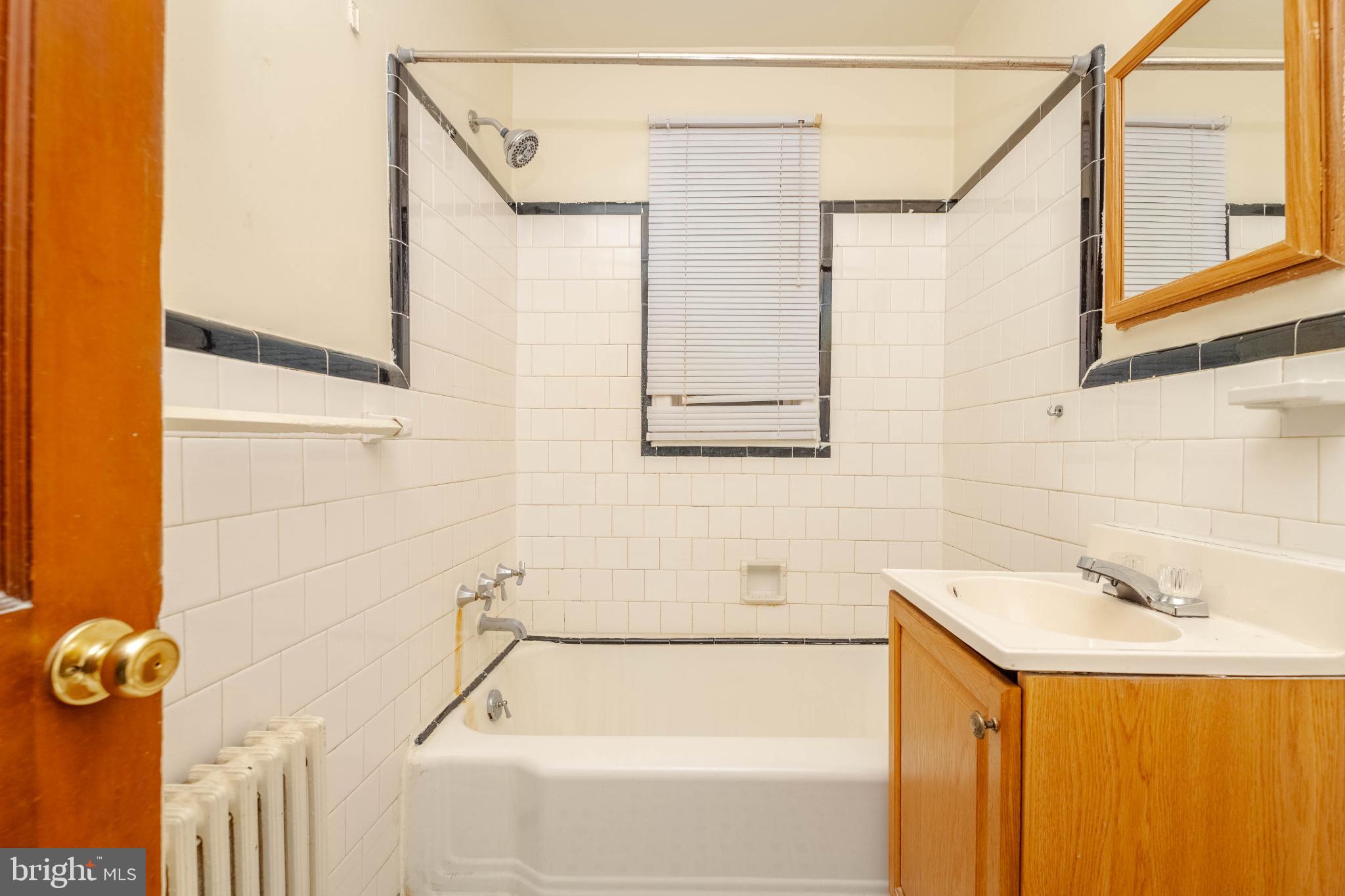 3500 4th Street Baltimore, MD 21225 - Photo 15 of 43 Charming bathroom with classic tile accents.