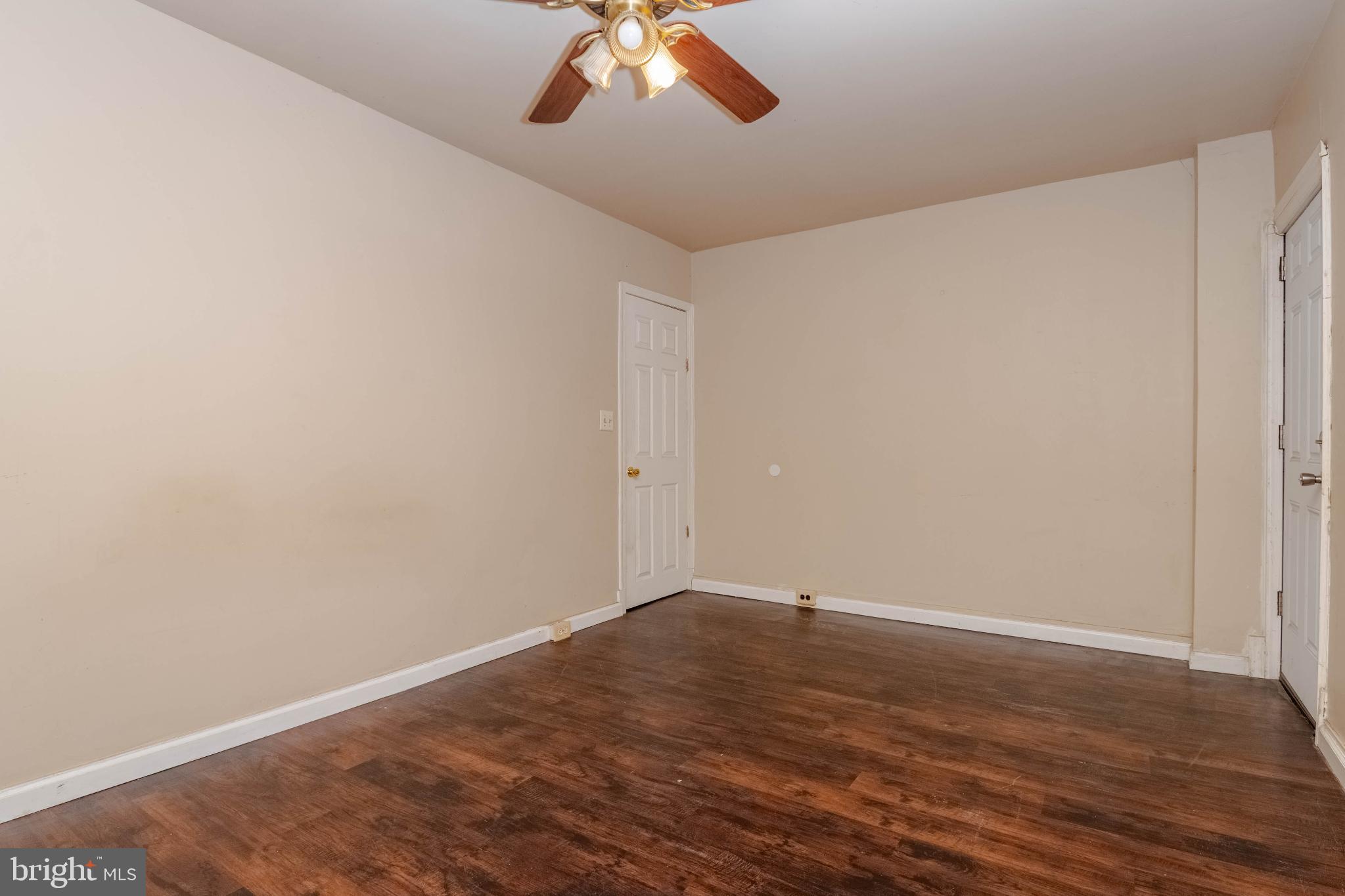 3500 4th Street Baltimore, MD 21225 - Photo 24 of 43 Spacious room with warm wood flooring.