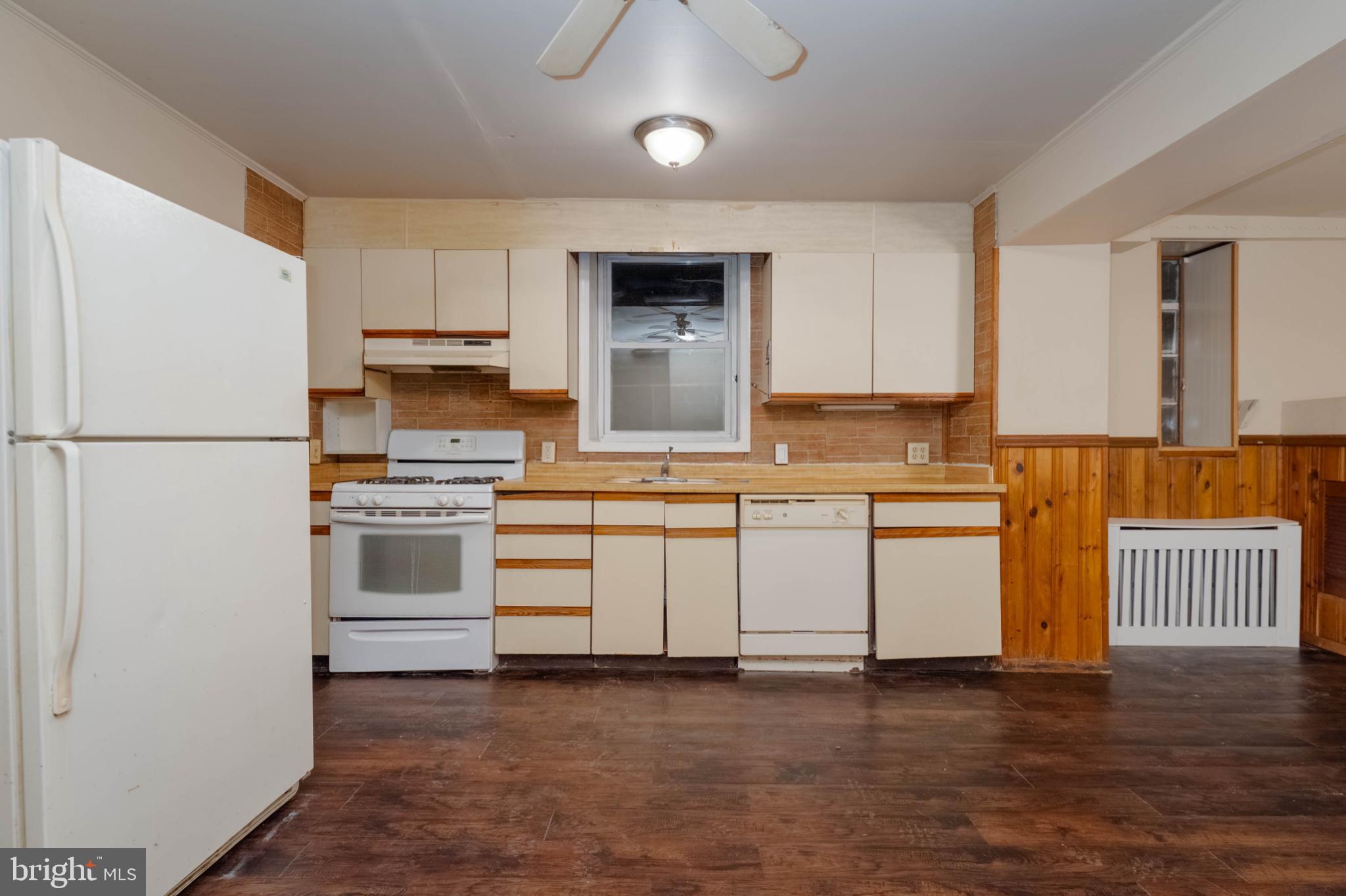 3500 4th Street Baltimore, MD 21225 - Photo 25 of 43 Spacious kitchen with warm wooden accents.