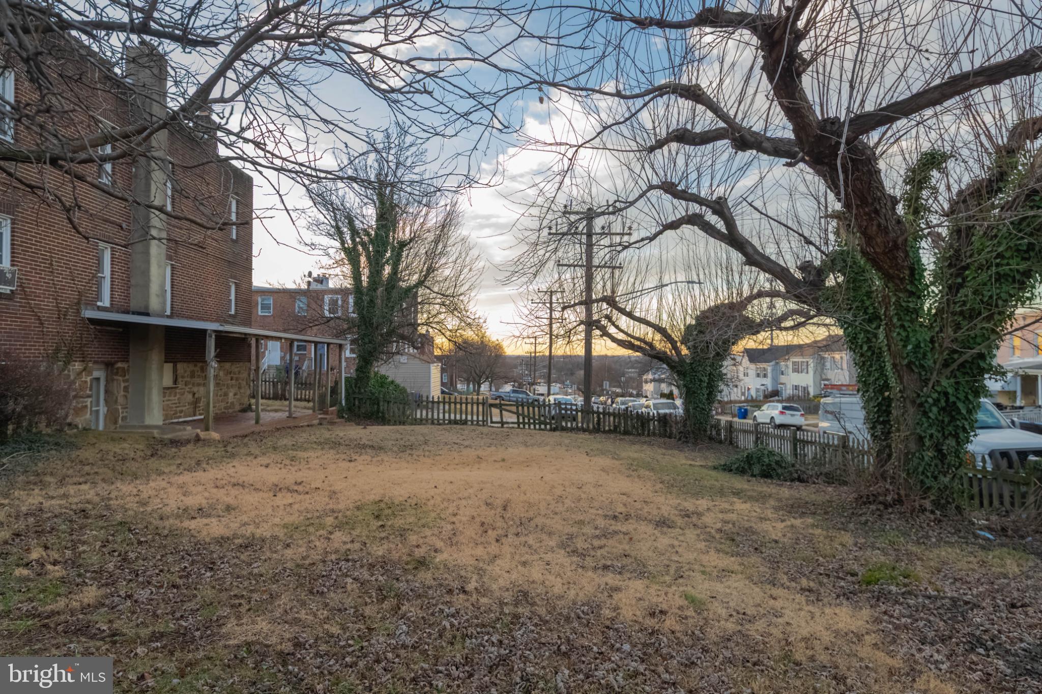 3500 4th Street Baltimore, MD 21225 - Photo 34 of 43 Spacious yard with serene sunset views.