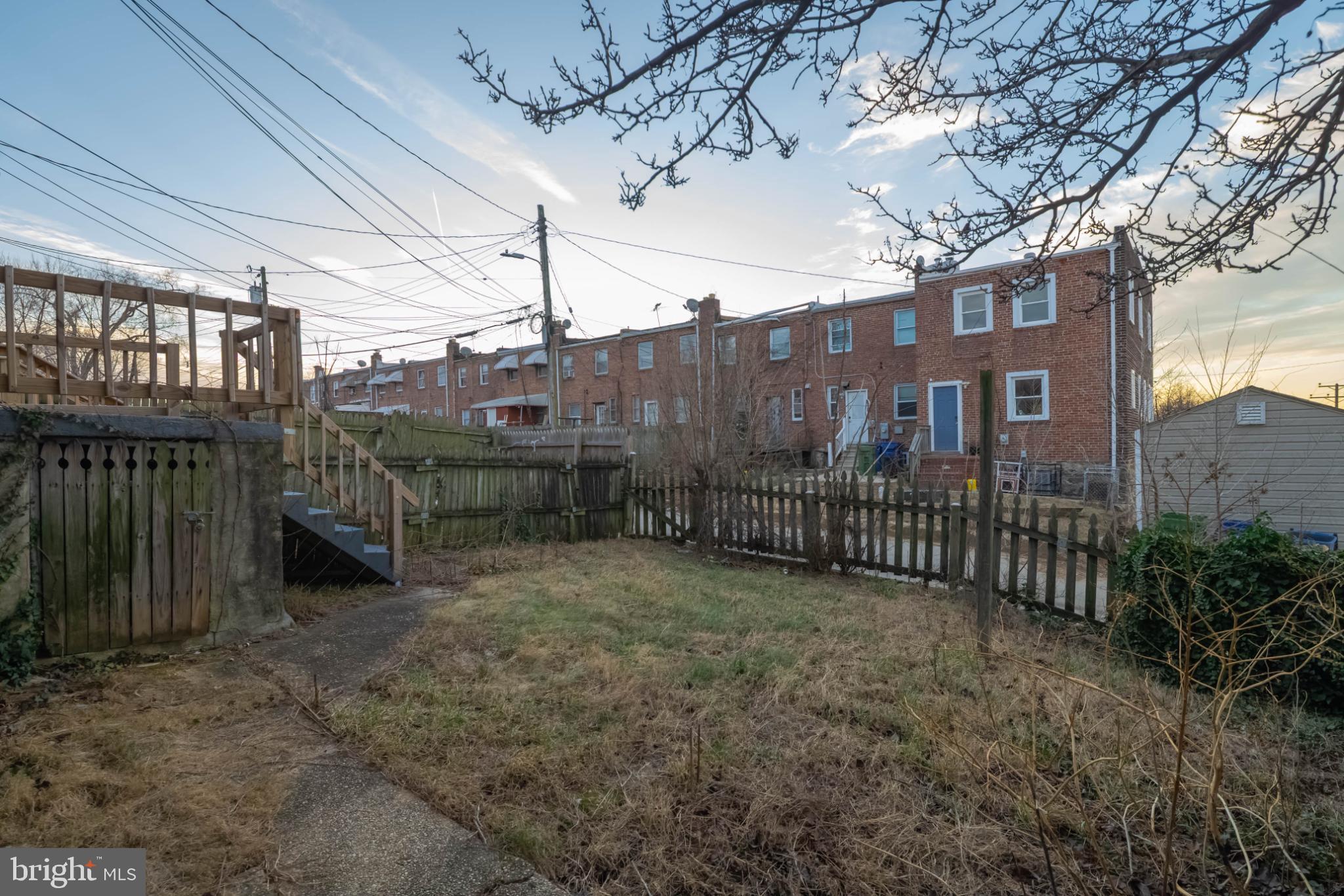 3500 4th Street Baltimore, MD 21225 - Photo 37 of 43 Charming backyard with rustic fencing.