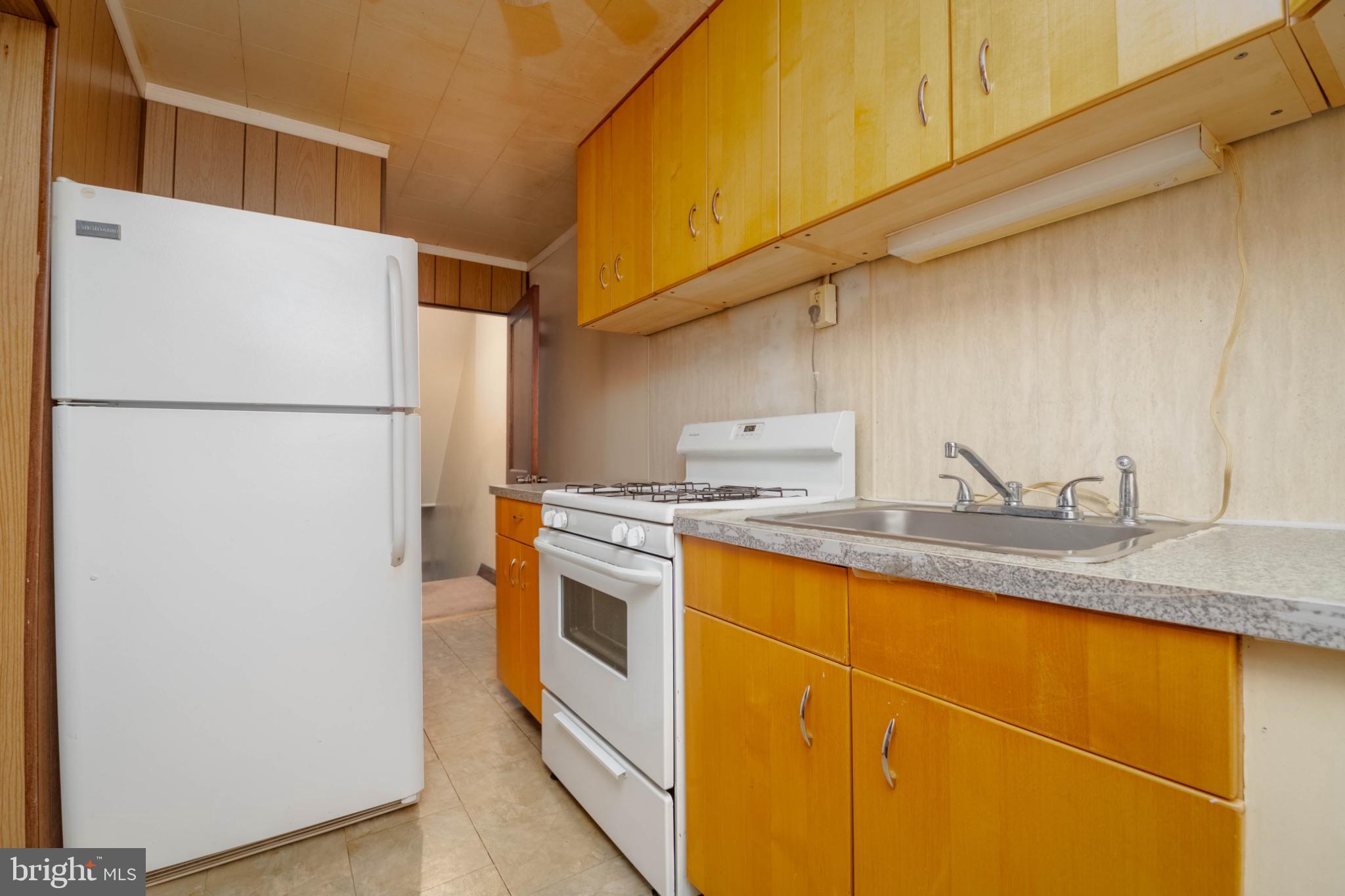 3500 4th Street Baltimore, MD 21225 - Photo 8 of 43 Cozy kitchen with warm wood accents.