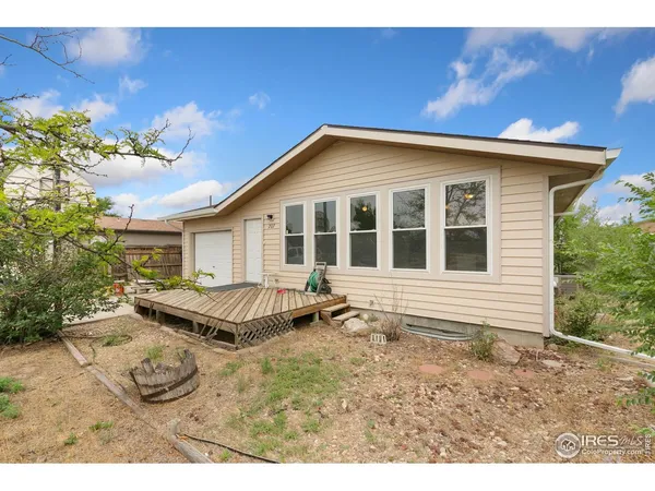 a house view with a backyard space