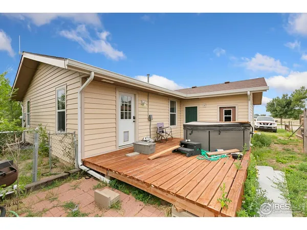 a balcony view with a seating space