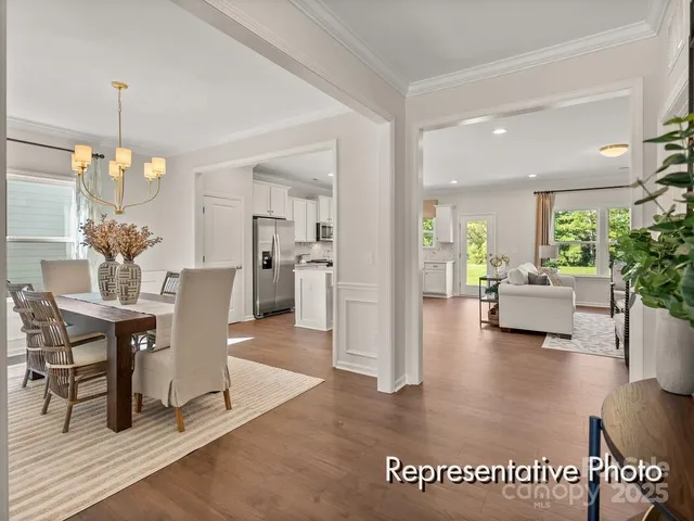 a view of a livingroom with furniture and a table