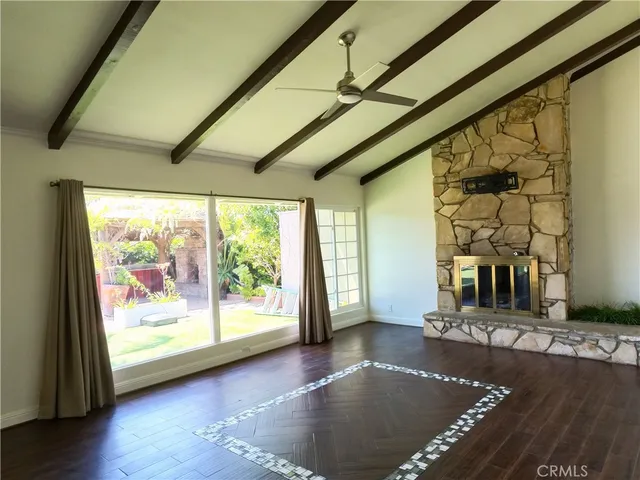 a view of an entryway with a floor to ceiling window