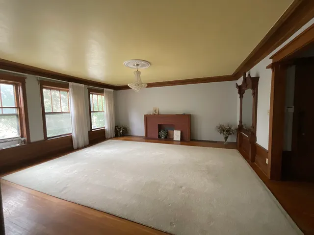 a big room with windows and closet