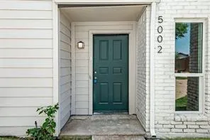 a view of a entryway of the house