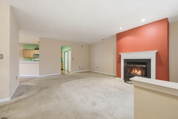 a view of a room with a large window