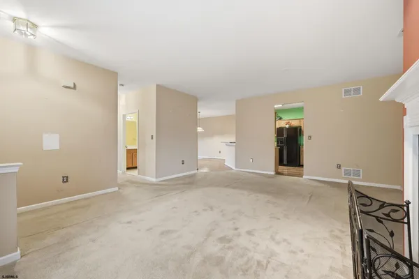 a kitchen with a refrigerator sink and microwave