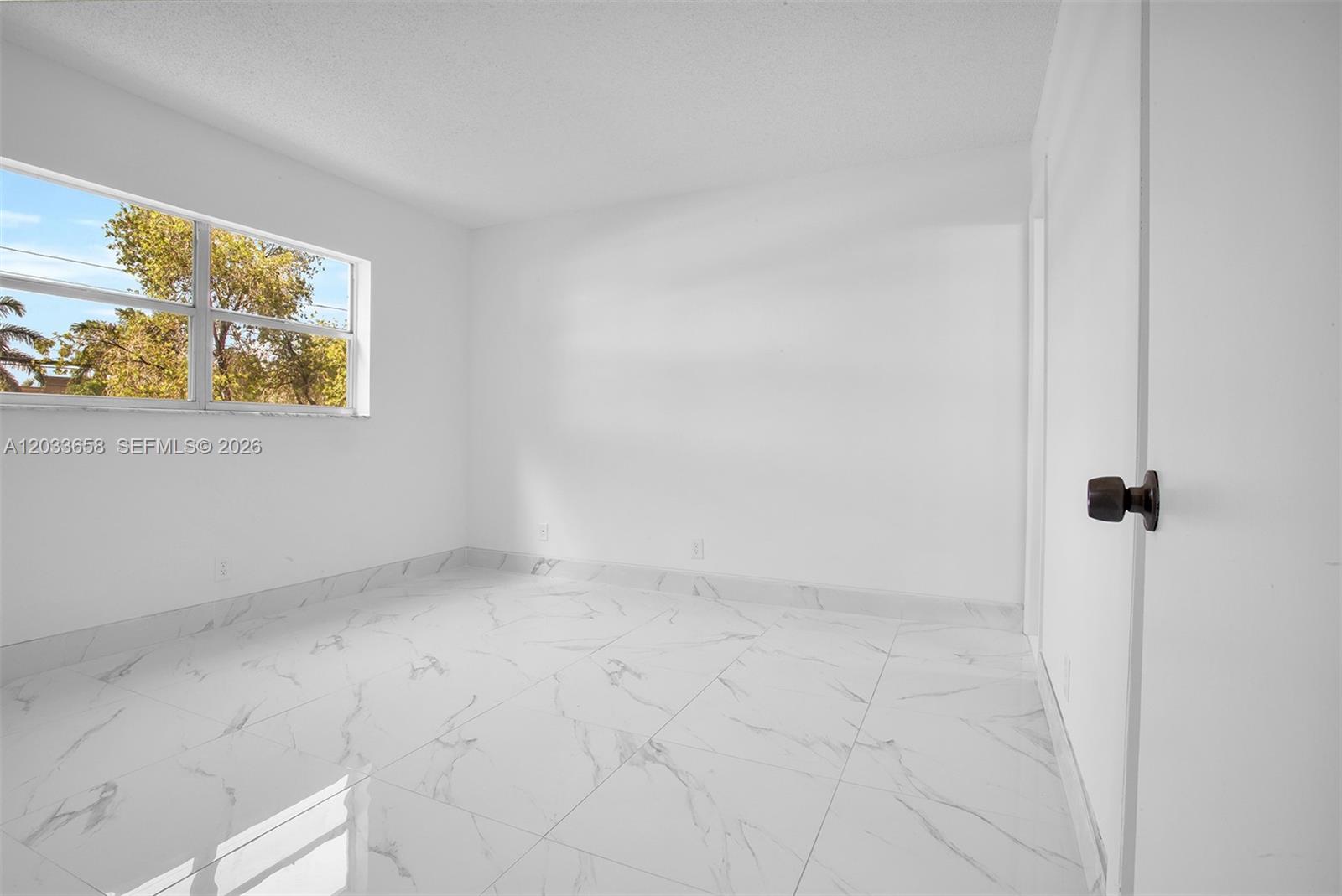 8852 West McNab Road, Unit 205 Tamarac, FL 33321 - Photo 14 of 41 Master Bedroom