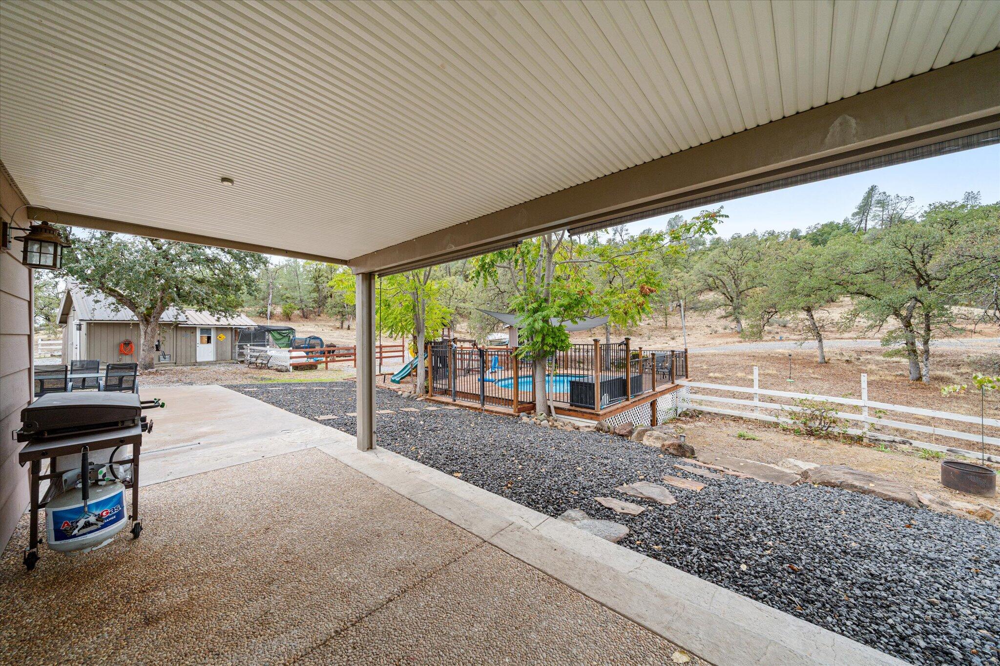 10190 Oak Run Road Oak Run, CA 96069 - Photo 53 of 78 a view of a porch with furniture and garden