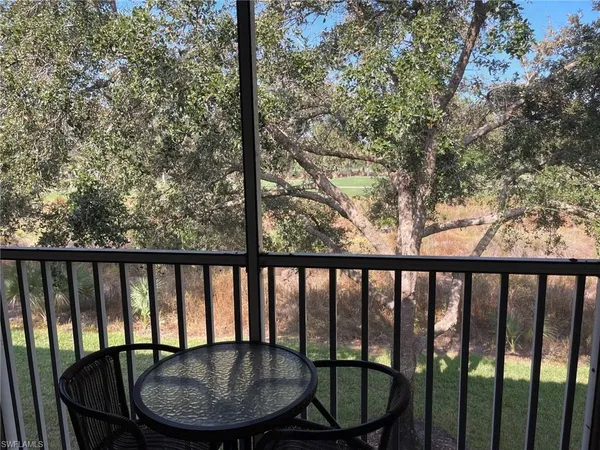 a view of a balcony with a swing