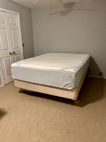 a bathroom with a toilet and a bathtub