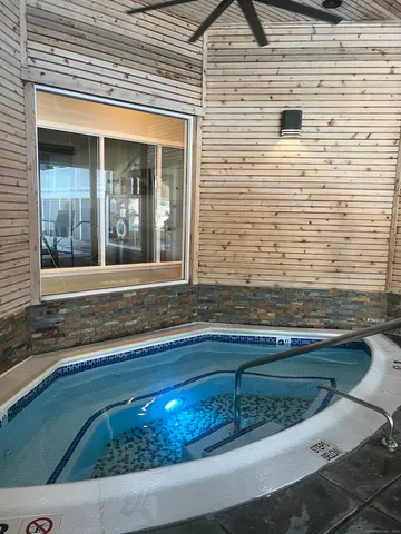 a room with furniture and wooden floor