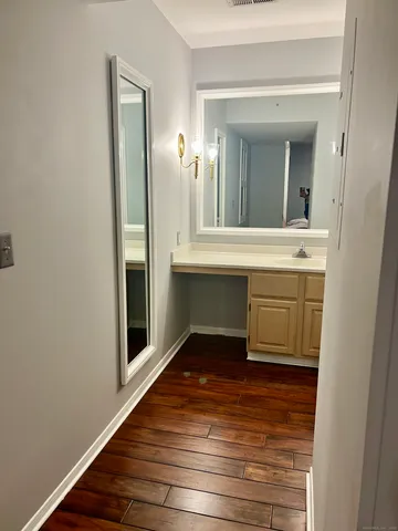 a bathroom with a bathtub and shower
