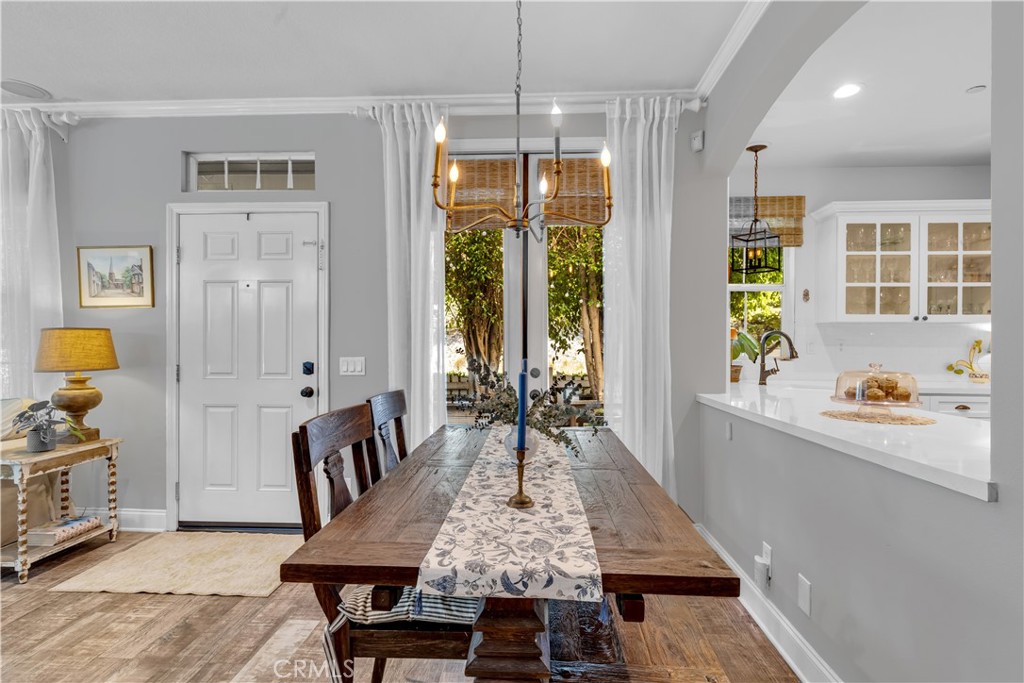 5 Surrey Farm Way Ladera Ranch, CA 92694 - Photo 25 of 46 Dining Area with chic gold light fixture and French Doors to private patio.
