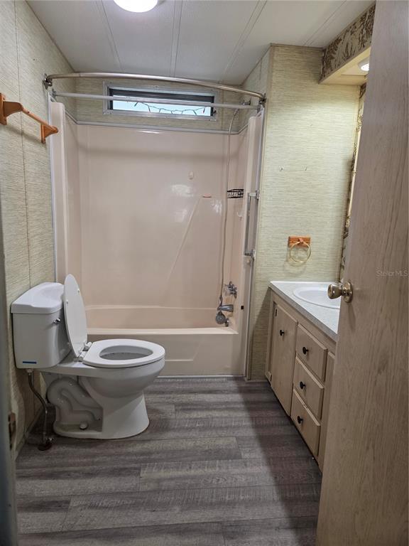 8828 Kanawha Road Riverview, FL 33578 - Photo 12 of 13 a bathroom with a toilet a sink and shower