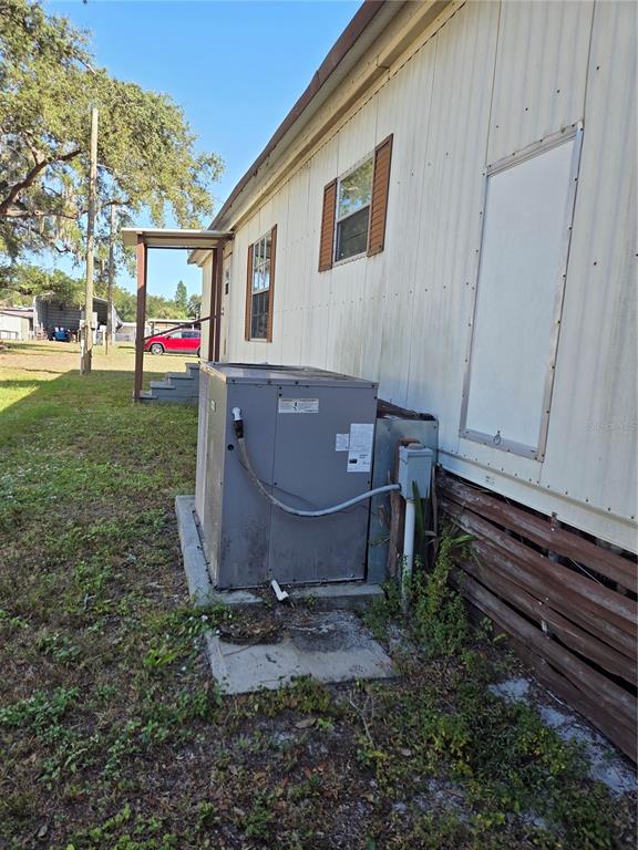 8828 Kanawha Road Riverview, FL 33578 - Photo 5 of 13 a view of house with backyard