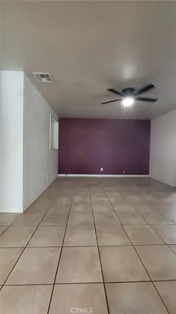 a view of a hallway with a window