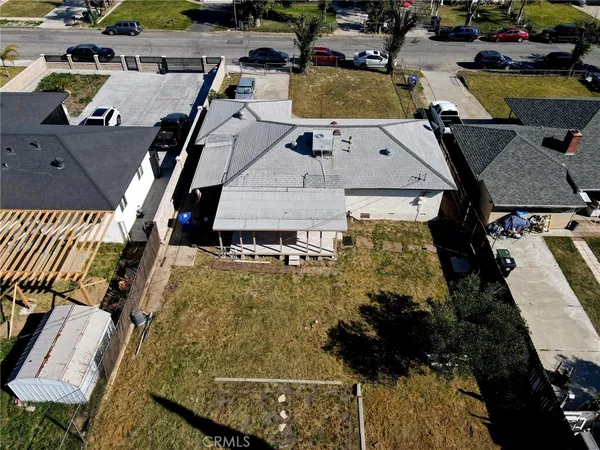 an aerial view of a houses with outdoor space