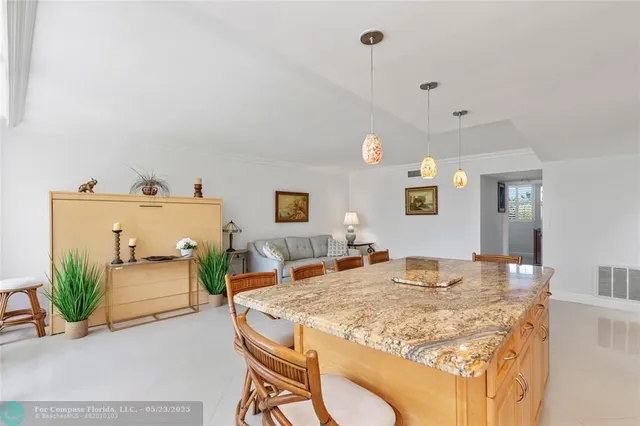 a bedroom with a bed and a table