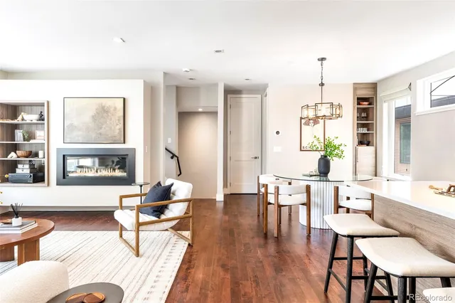 a living room with furniture or window and a wooden floor
