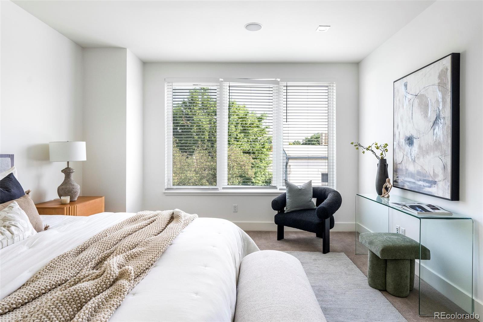 3619 Navajo Street Denver, CO 80211 - Photo 9 of 24 a bedroom with a bed and a large window