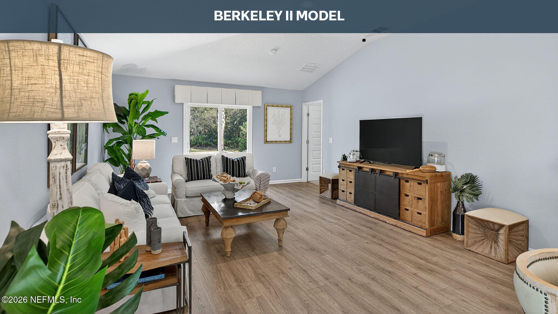 12197 Yew Tree Road Jacksonville, FL 32218 - Photo 11 of 52 a living room with furniture and a flat screen tv