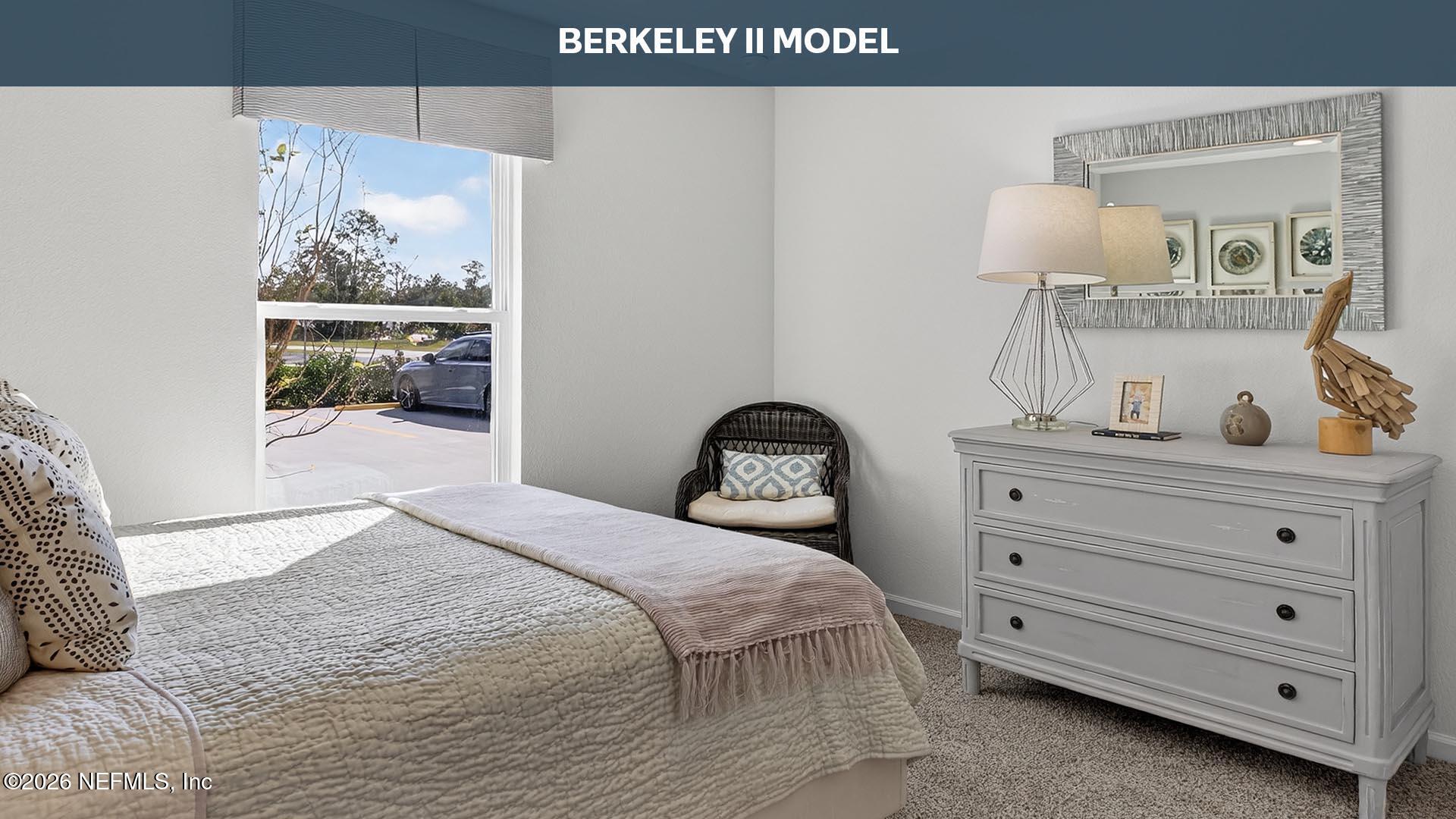 12197 Yew Tree Road Jacksonville, FL 32218 - Photo 21 of 52 a bedroom with a bed and a mirror