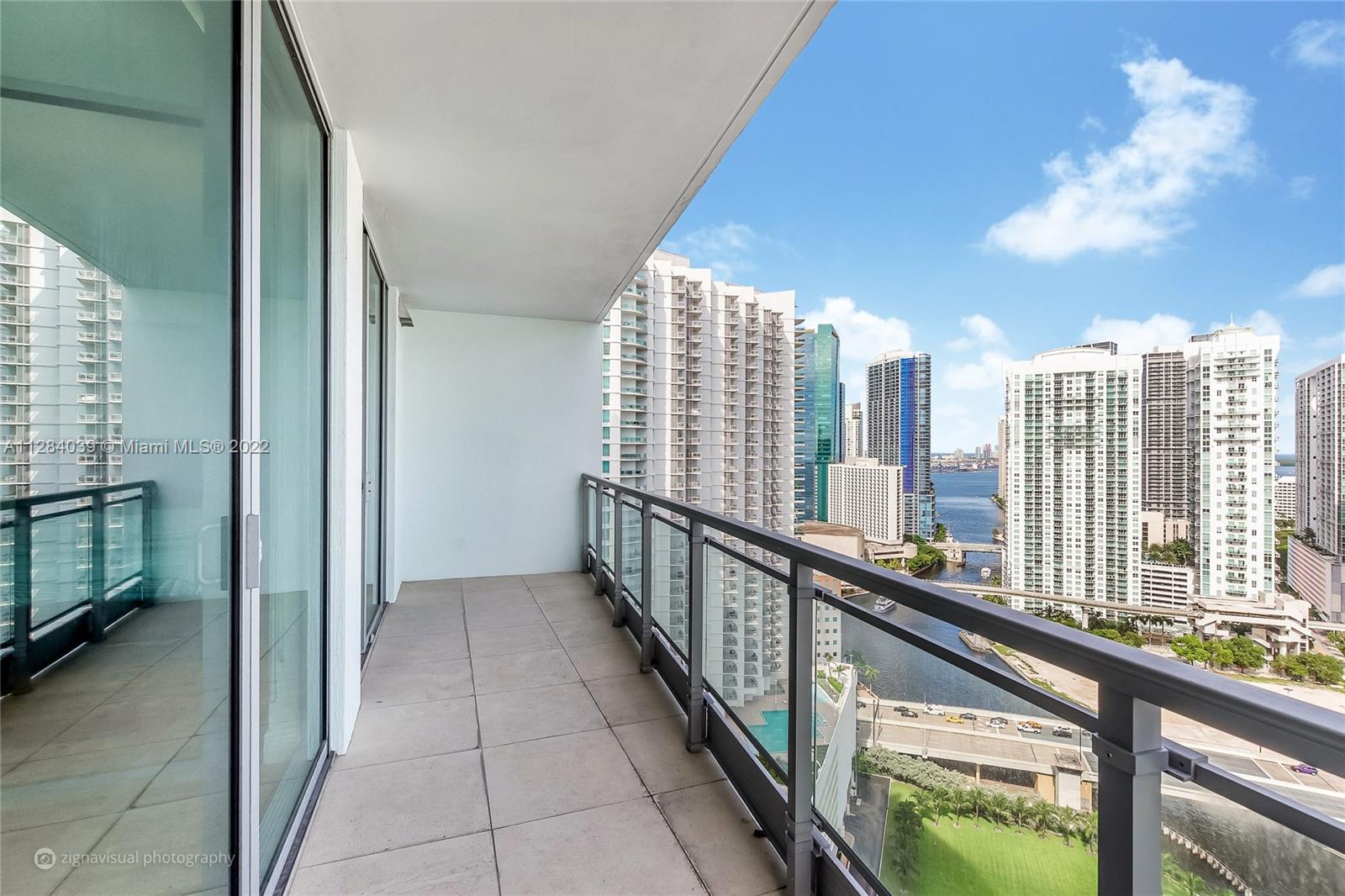 90 Southwest 3rd Street, Unit 3012 Miami, FL 33130 - Photo 6 of 16 a view of city from a balcony