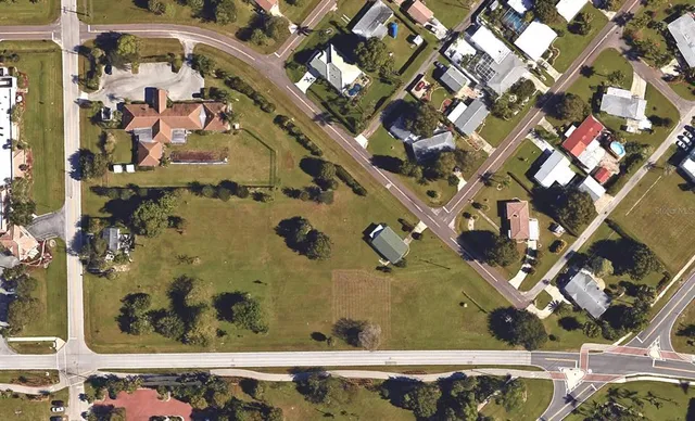 a view of a playground with basketball court