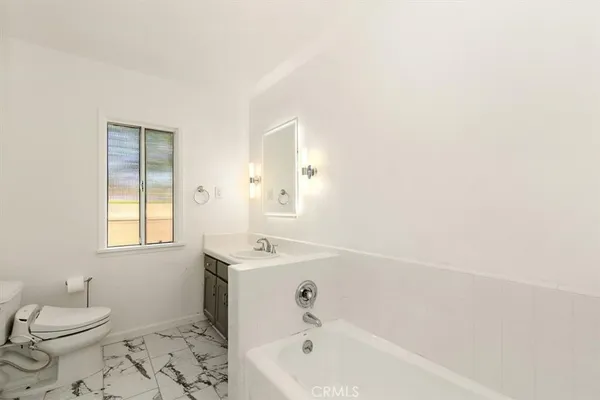 a bathroom with a sink and a toilet